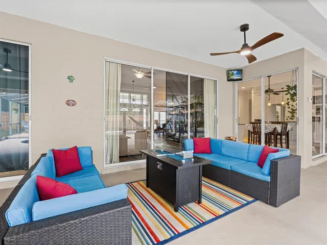 a living room with furniture and a couch