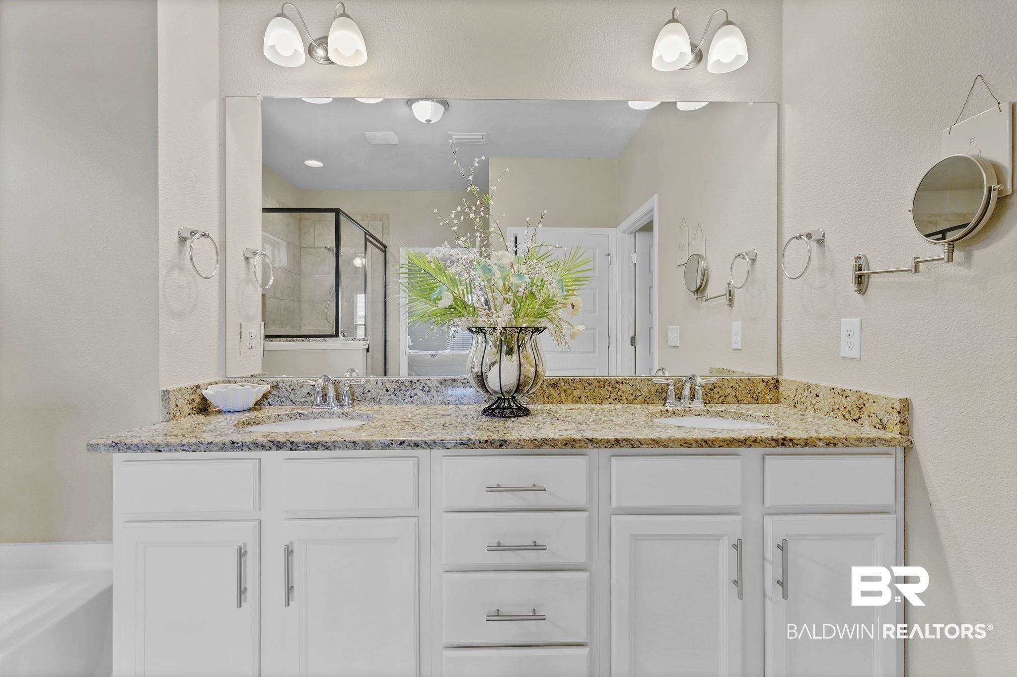 1547 Kairos Loop Foley, AL 36535 - Photo 21 of 55 Bathroom with a sink, a shower stall, a bathing tub, and double vanity
