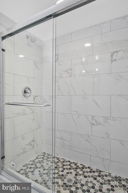 4004 Dudley Avenue Baltimore, MD 21213 - Photo 23 of 36 a bathroom with a shower