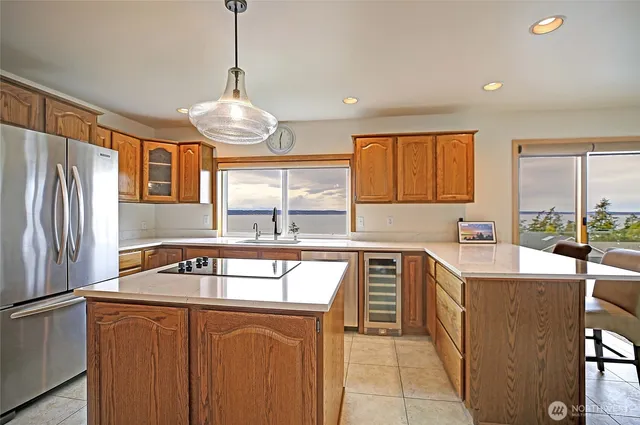 a kitchen with a sink and a window