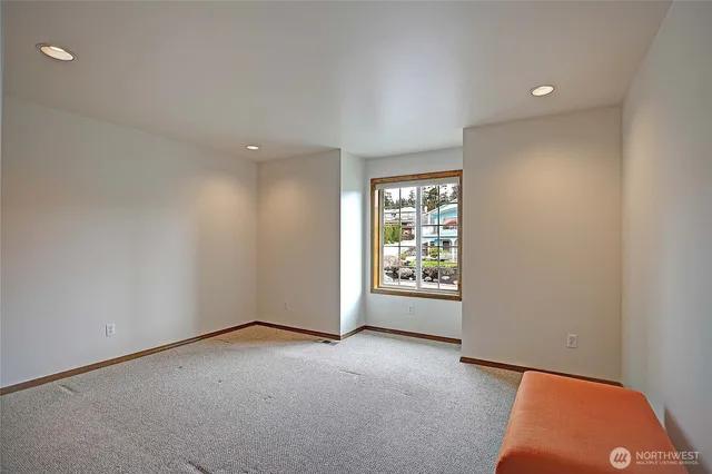 a bathroom with a double vanity sink mirror and toilet