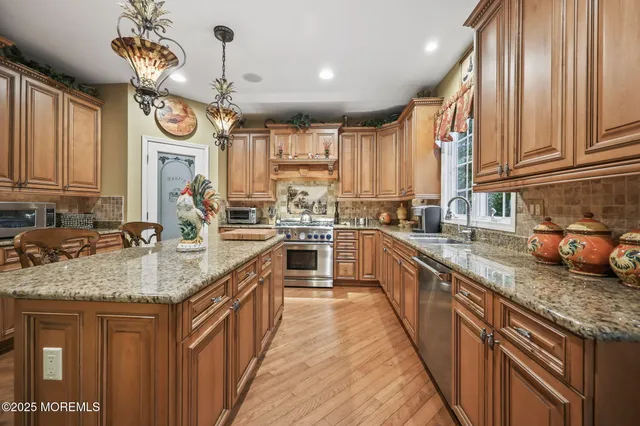 a bedroom with a bed couch and a window