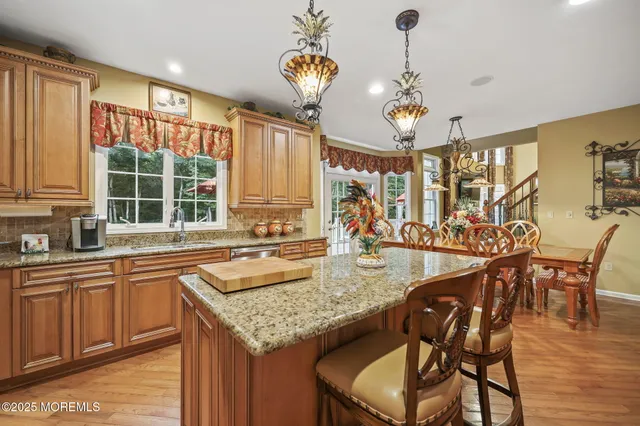 a bathroom with a tub sink and shower