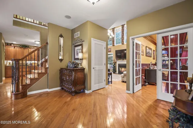 a kitchen with stainless steel appliances granite countertop a sink and cabinets