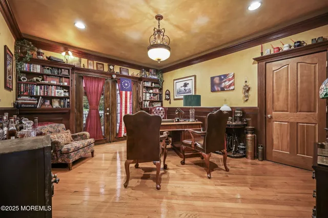 a living room with fireplace furniture and a flat screen tv