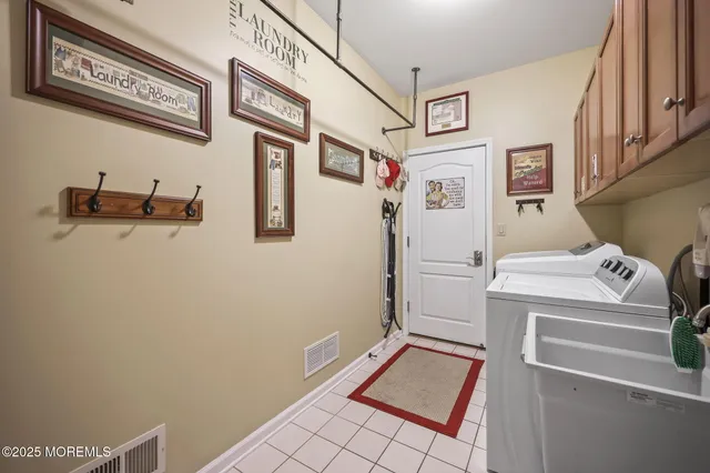a bathroom with a toilet a sink and a mirror