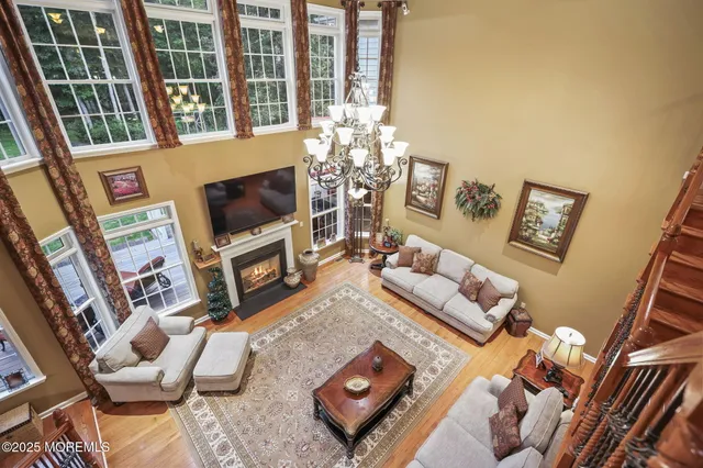 a bathroom with a double vanity sink mirror and shower