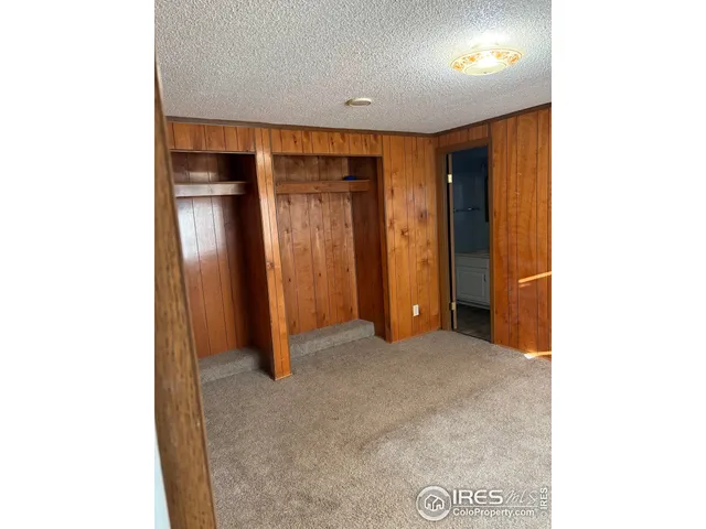 a view of a livingroom with wooden floor