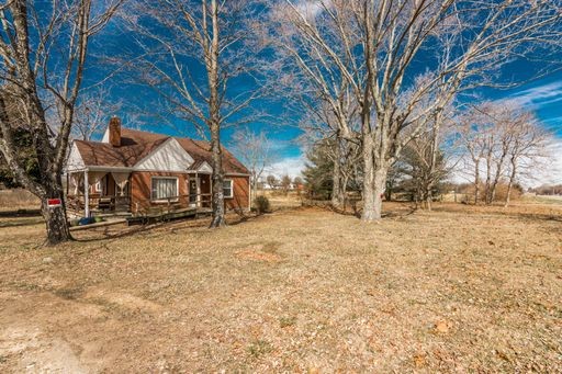 3105 Academy Road Portland, TN 37148 - Photo 1 of 17 a view of house with snow on the road