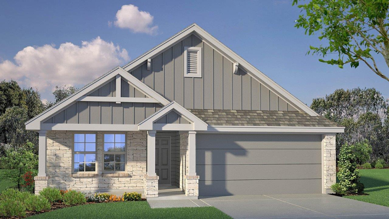 Crafted with durable stone and siding, this charming home features a welcoming covered entry and an attached garage.