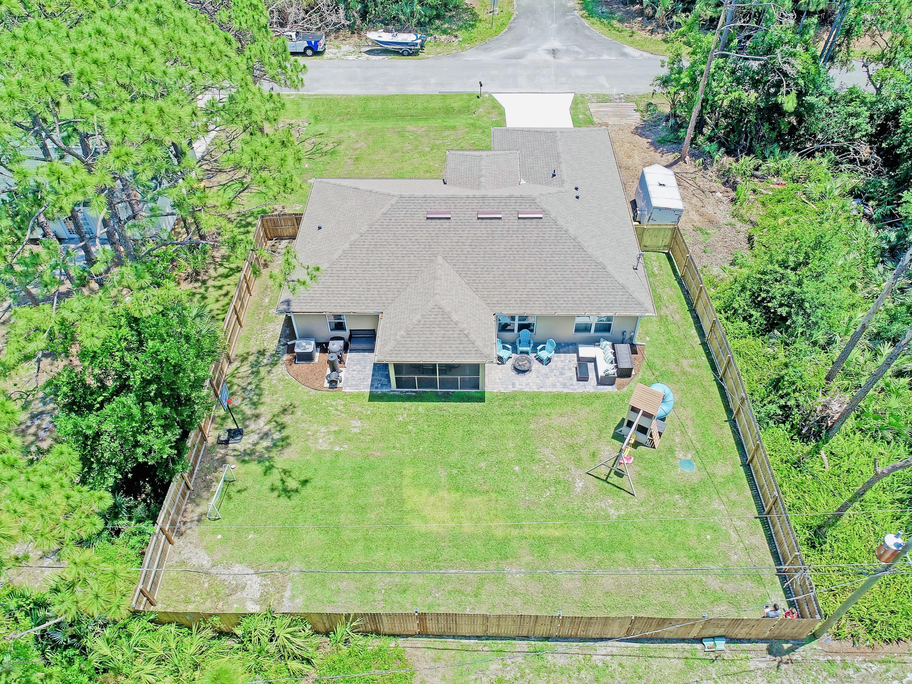 919 Thompson Road Southwest Palm Bay, FL 32908 - Photo 38 of 38 an aerial view of a house