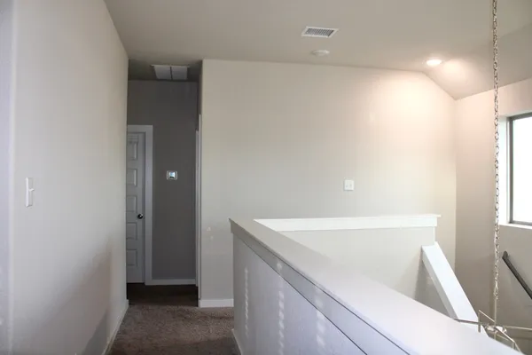 a view of walk in closet with window