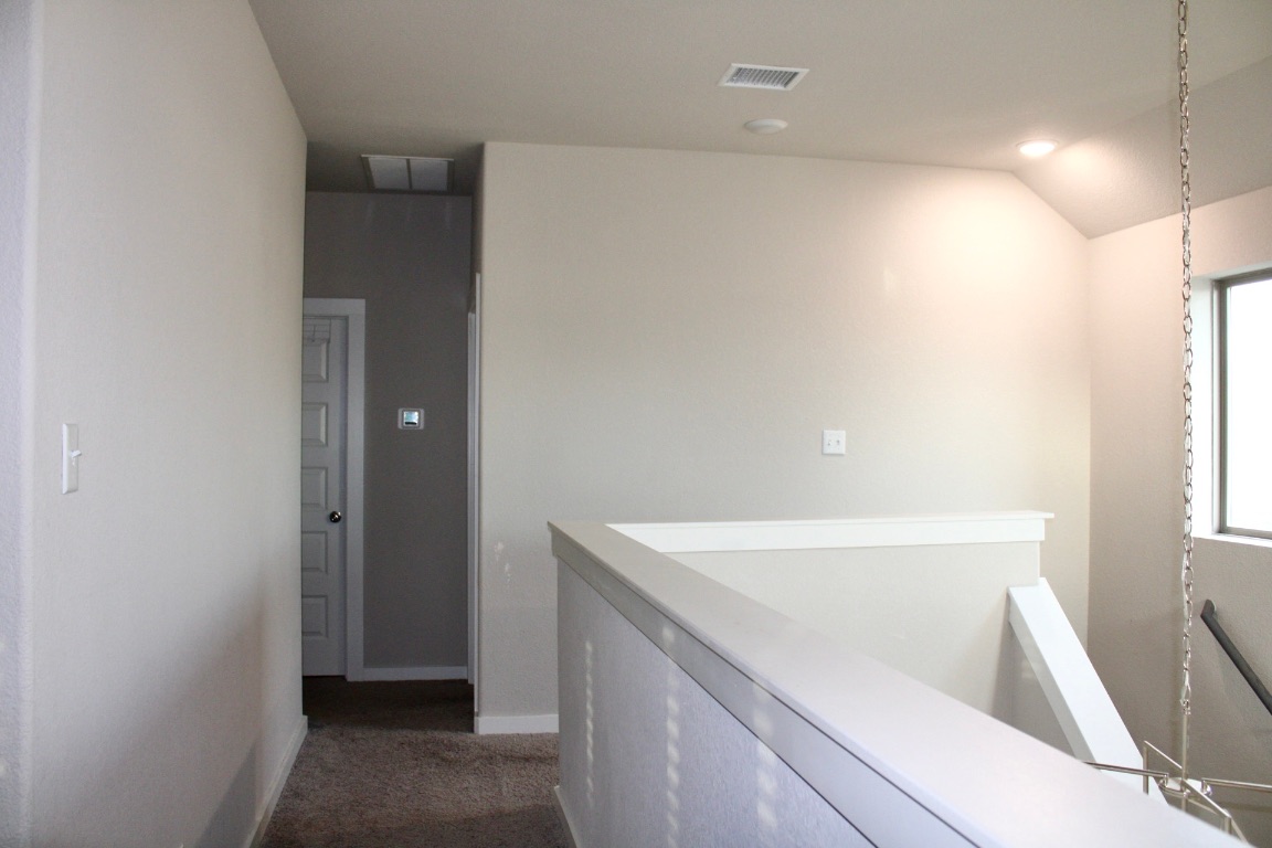 174 Gullivers Drive Elgin, TX 78621 - Photo 11 of 28 a view of walk in closet with window