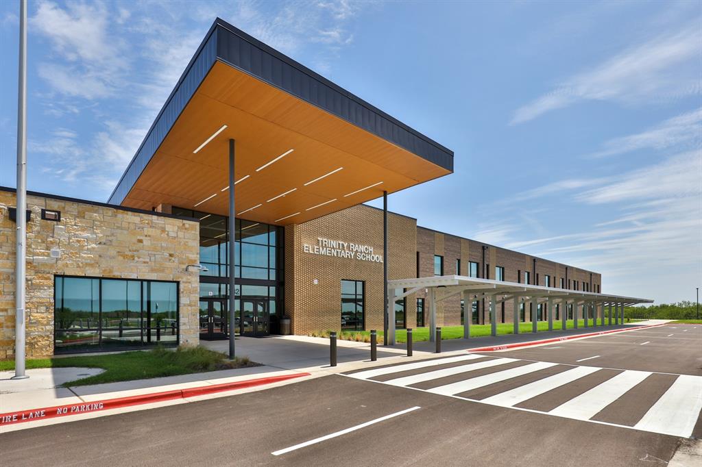 174 Gullivers Drive Elgin, TX 78621 - Photo 21 of 28 a view of street with shops