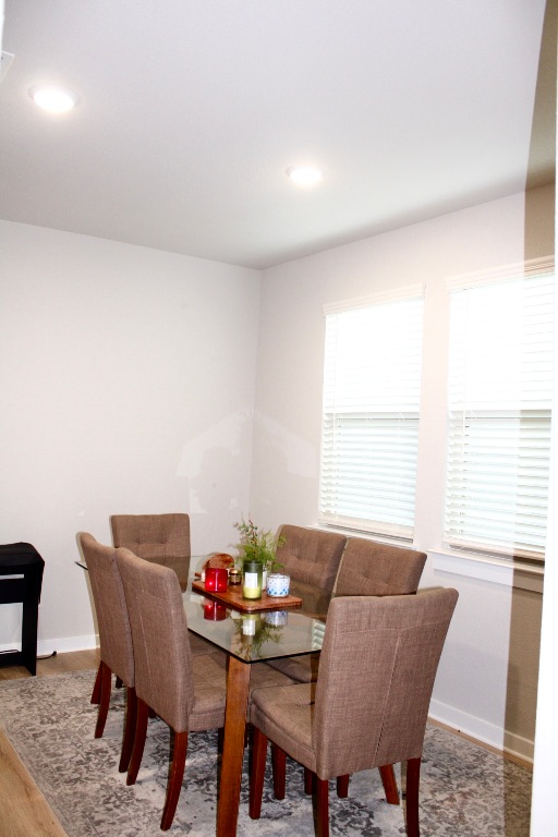 174 Gullivers Drive Elgin, TX 78621 - Photo 6 of 28 a dining room with furniture and window