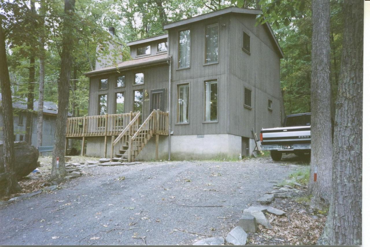 2720 Radcliff Road Bushkill, PA 18324 - Photo 1 of 1 a view of a house with a yard