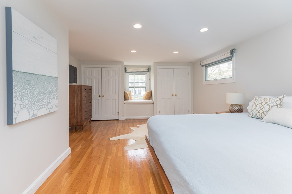 88 Lindbergh Avenue Needham, MA 02494 - Photo 12 of 26 a spacious bedroom with a bed and a window