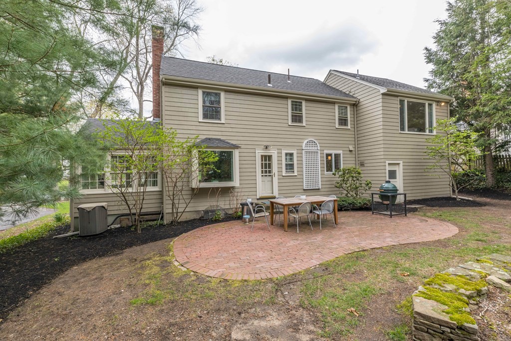 88 Lindbergh Avenue Needham, MA 02494 - Photo 22 of 26 a view of a house with backyard and sitting area