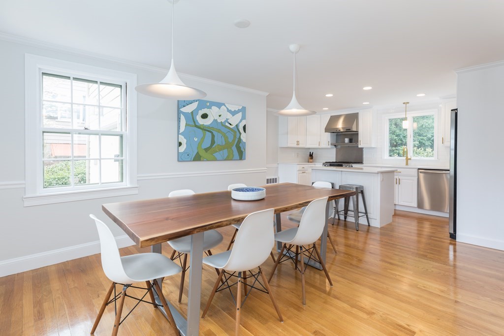 88 Lindbergh Avenue Needham, MA 02494 - Photo 4 of 26 a view of a dining room with furniture and wooden floor