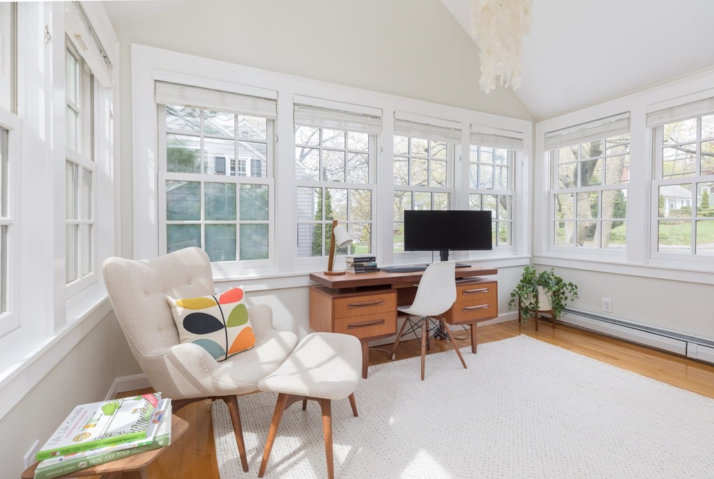 88 Lindbergh Avenue Needham, MA 02494 - Photo 7 of 26 a living room with furniture and a flat screen tv