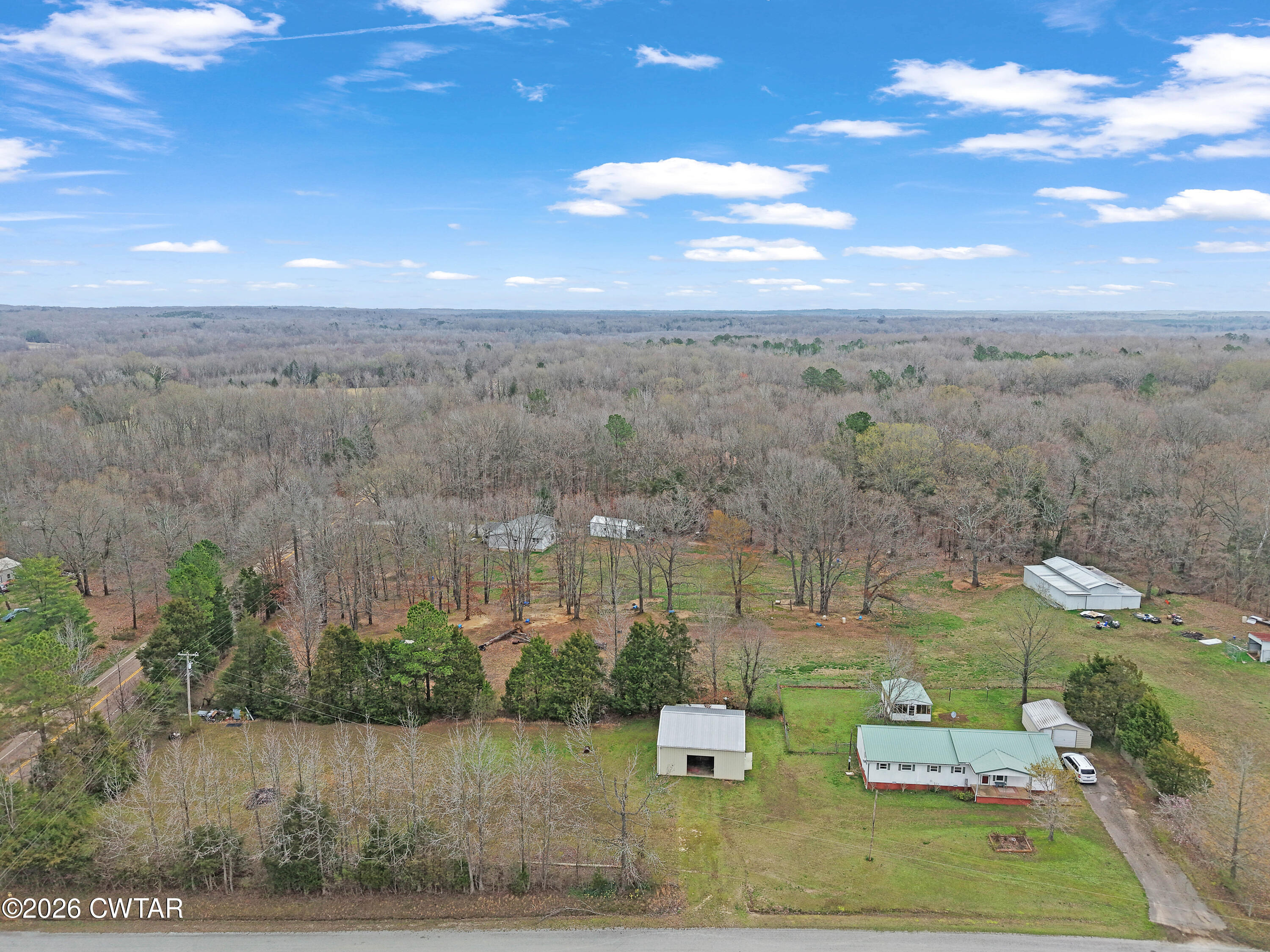 65 Aldridge Lane Jackson, TN 38305 - Photo 12 of 14 a view of a lake with couches