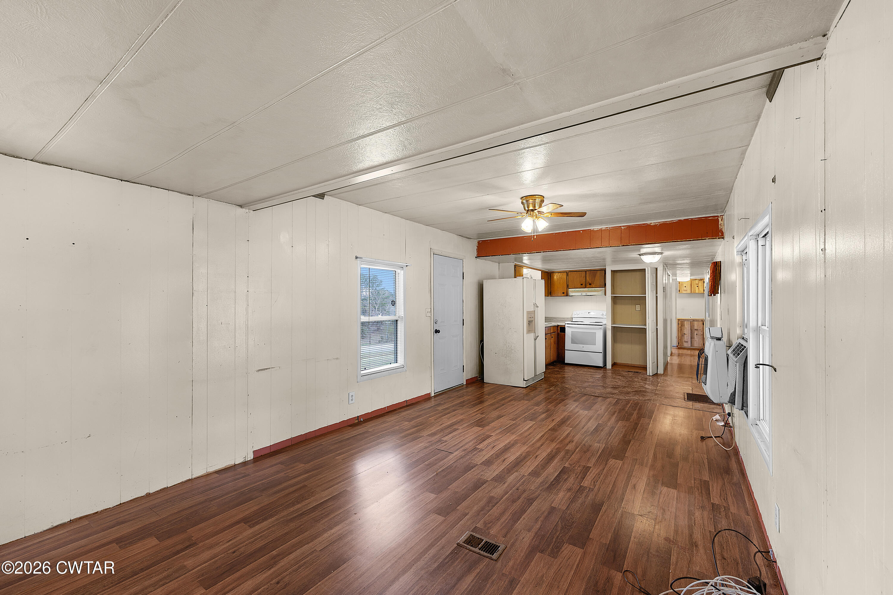 65 Aldridge Lane Jackson, TN 38305 - Photo 4 of 14 a view of a room with wooden floor
