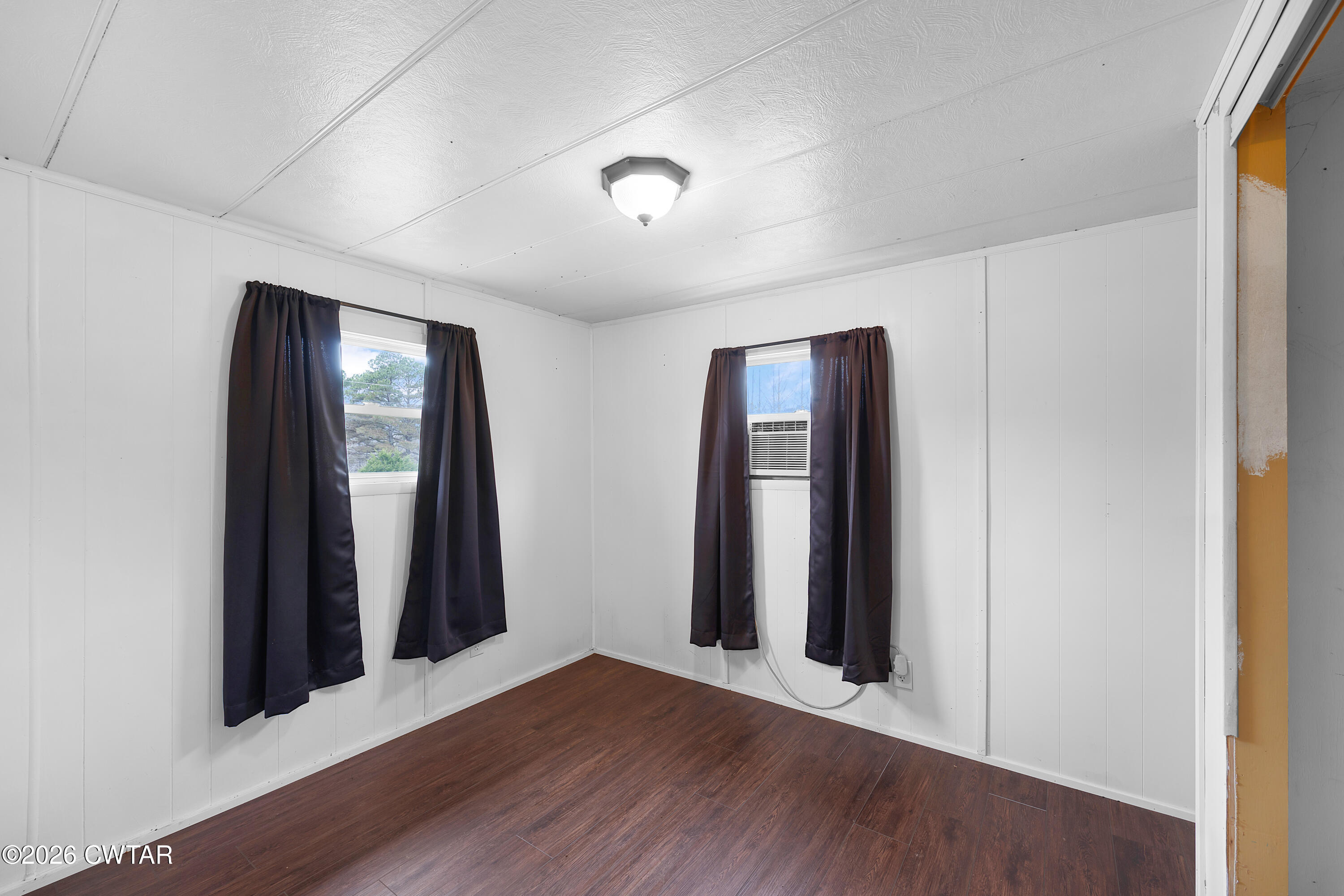 65 Aldridge Lane Jackson, TN 38305 - Photo 8 of 14 an entryway at a room with wooden floor