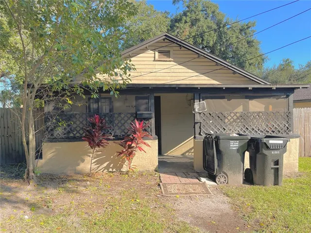 a front view of a house with a porch
