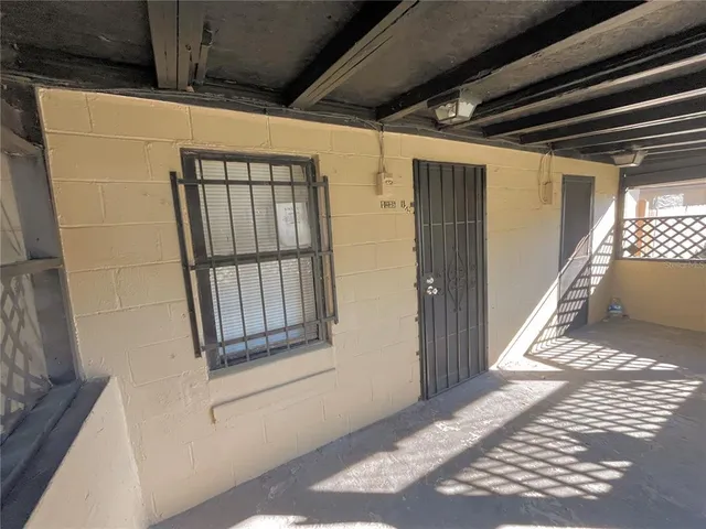 a view of an empty room and window