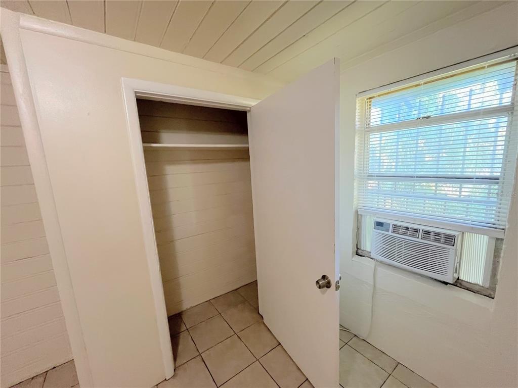 1235 Cypress Street, Unit 1/2 Orlando, FL 32805 - Photo 10 of 19 a view of an empty room with closet