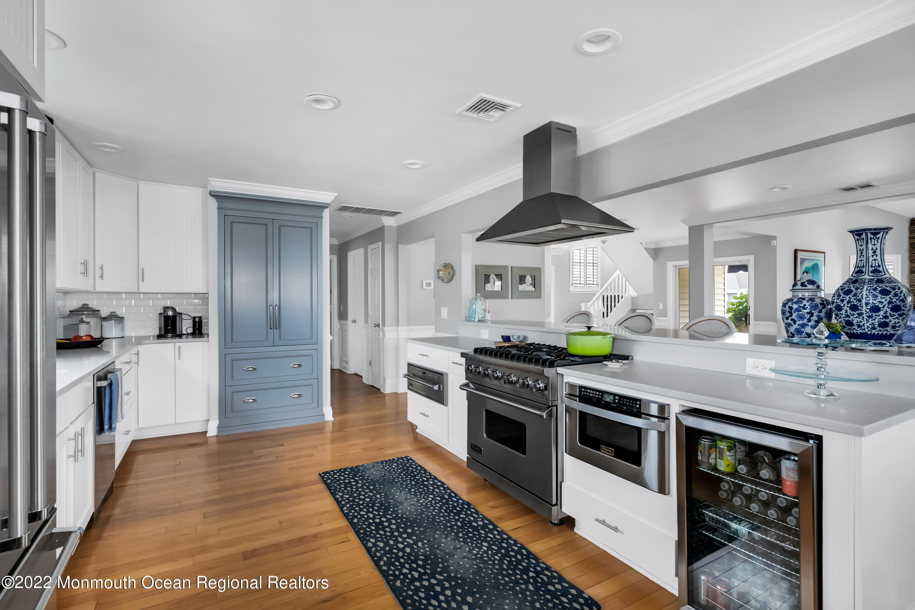 12 Captains Court Manasquan, NJ 08736 - Photo 11 of 30 a kitchen with stainless steel appliances granite countertop a stove and a sink