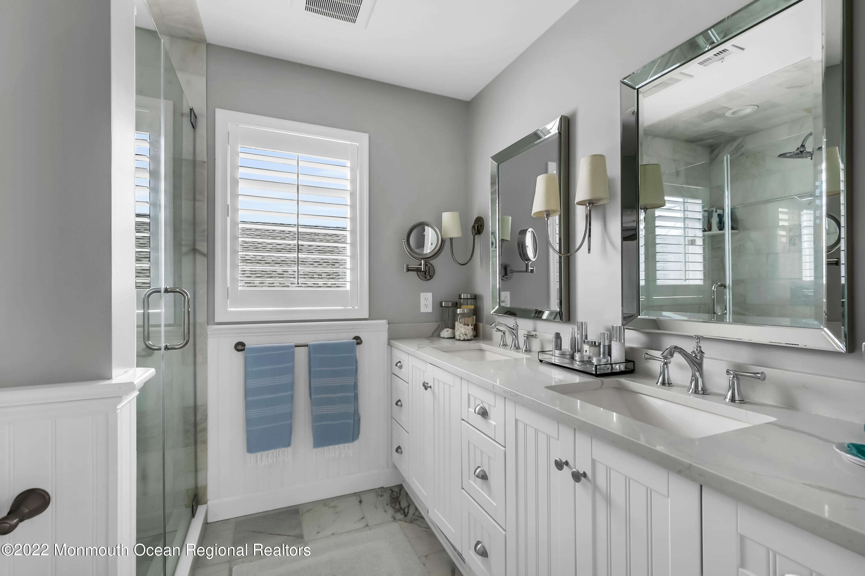 12 Captains Court Manasquan, NJ 08736 - Photo 15 of 30 a bathroom with double vanity and a mirror
