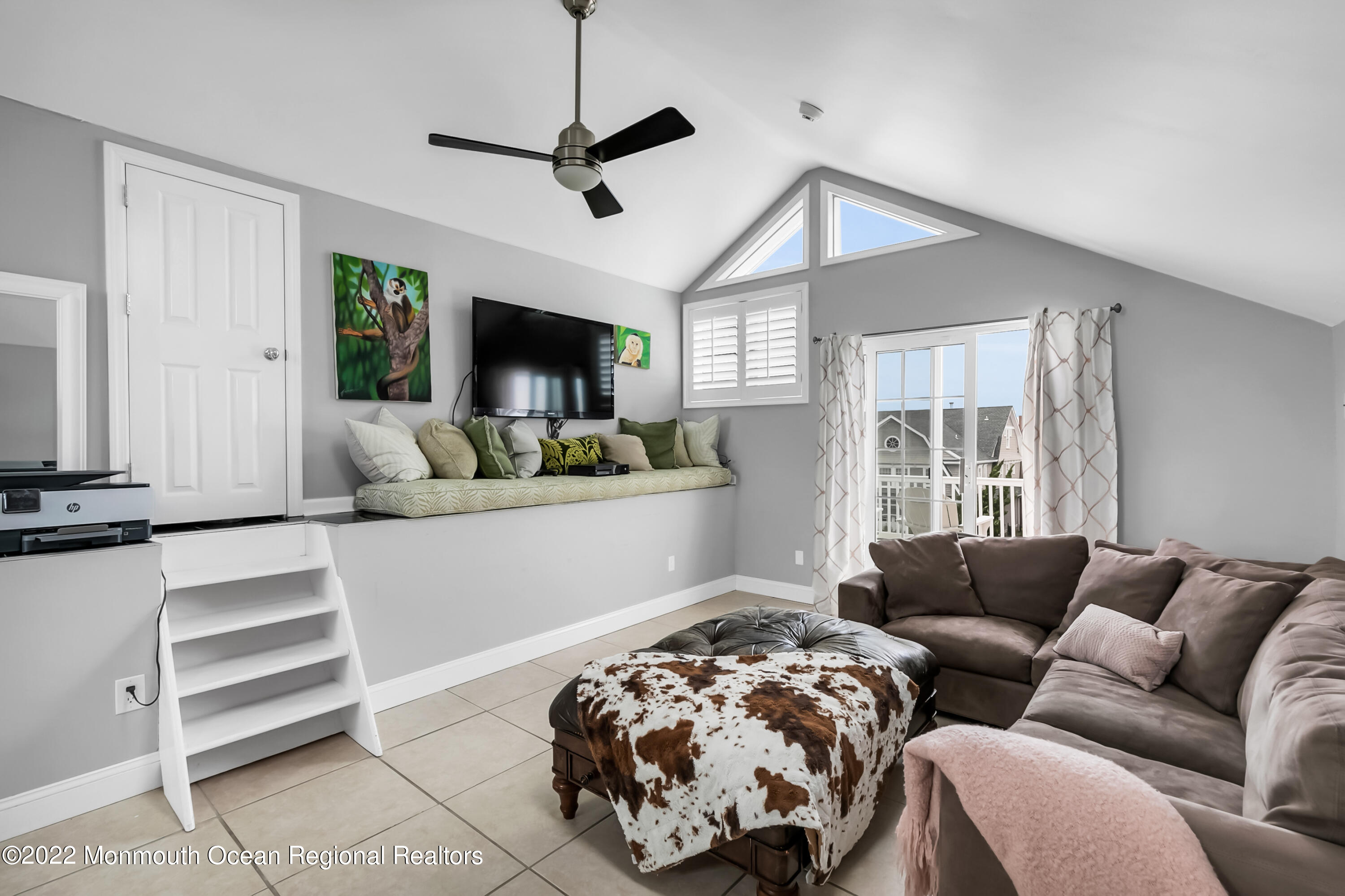 12 Captains Court Manasquan, NJ 08736 - Photo 20 of 30 a living room with furniture and a flat screen tv