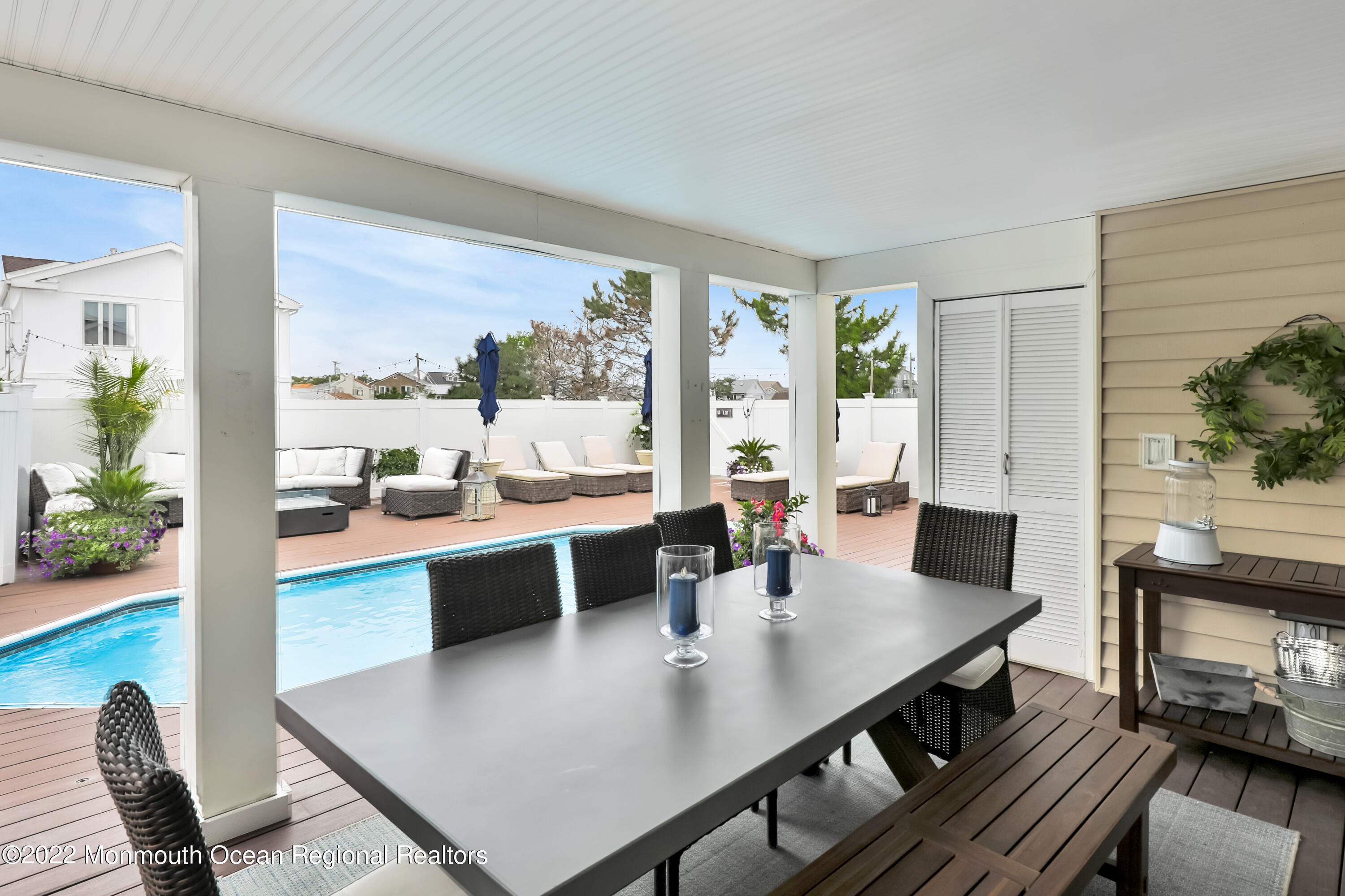 12 Captains Court Manasquan, NJ 08736 - Photo 27 of 30 a view of a dining room with furniture window and wooden floor