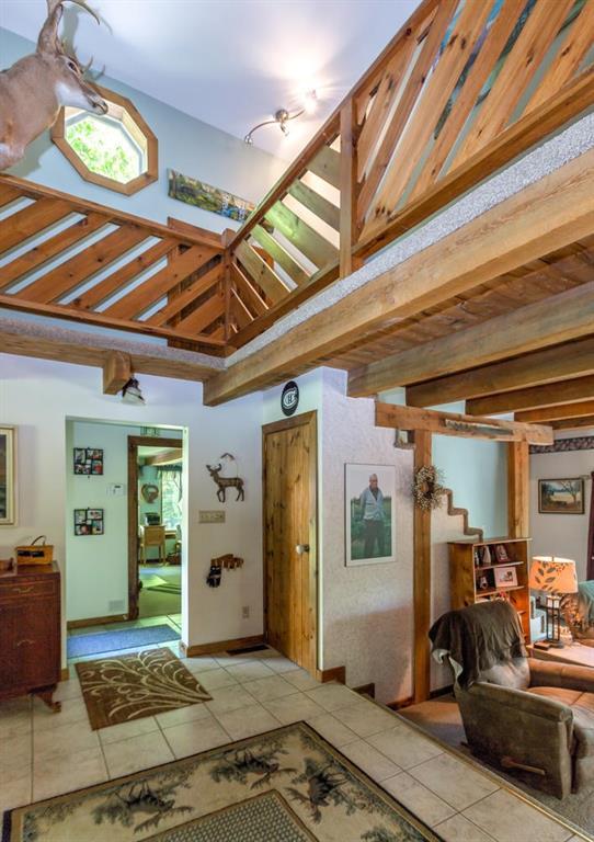 Vaulted foyer looking toward office...