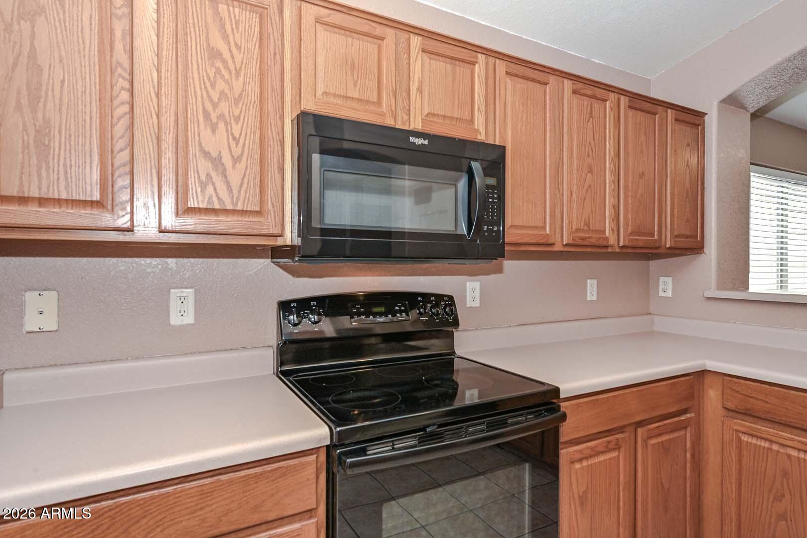13349 West Boca Raton Road Surprise, AZ 85379 - Photo 15 of 43 Kitchen-Range