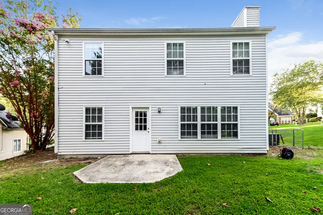 a view of outdoor space yard and front view of a house
