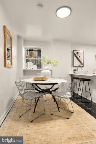 a workspace with furniture and window