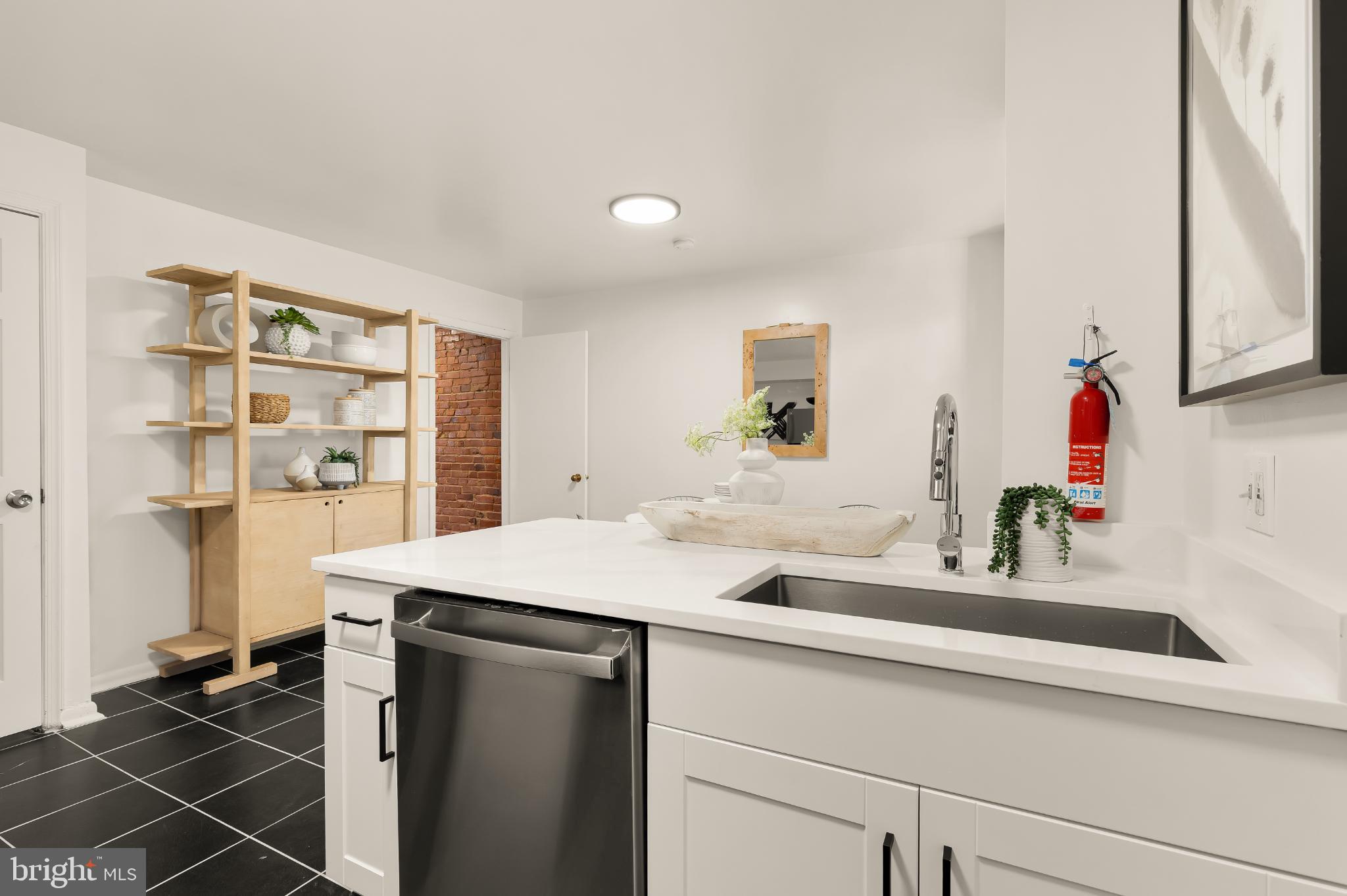 31 Florida Avenue Northeast Washington, DC 20002 - Photo 20 of 46 a bathroom with a sink and a mirror