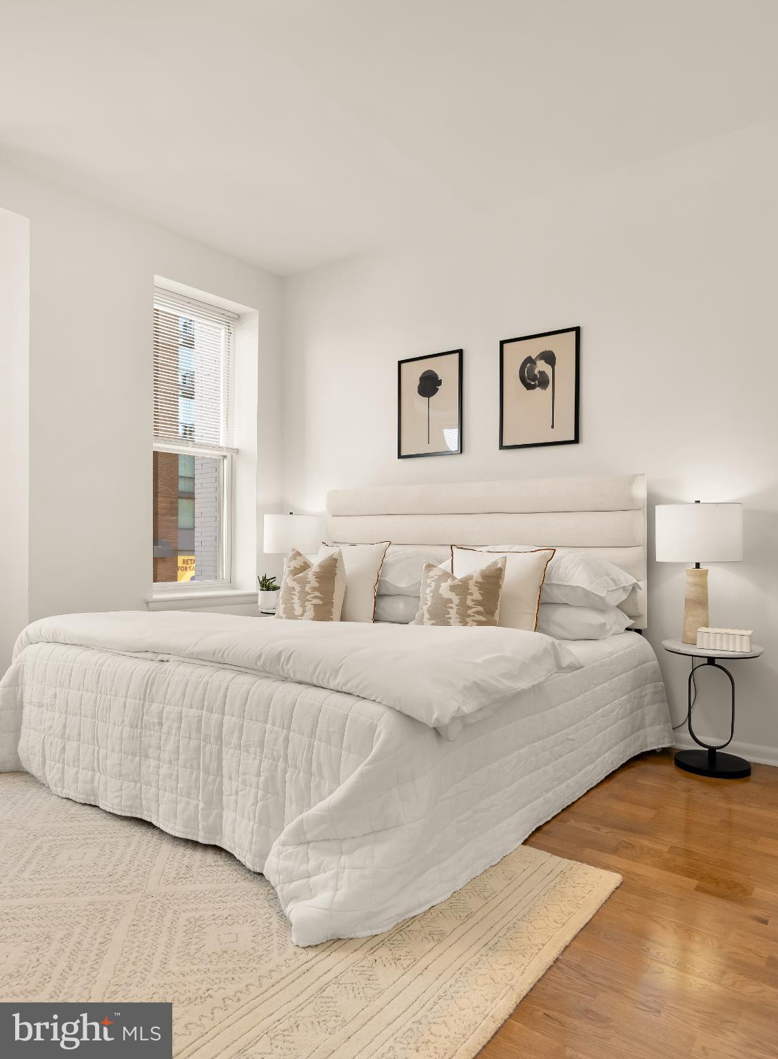 31 Florida Avenue Northeast Washington, DC 20002 - Photo 25 of 46 a bedroom with a large bed and a couch