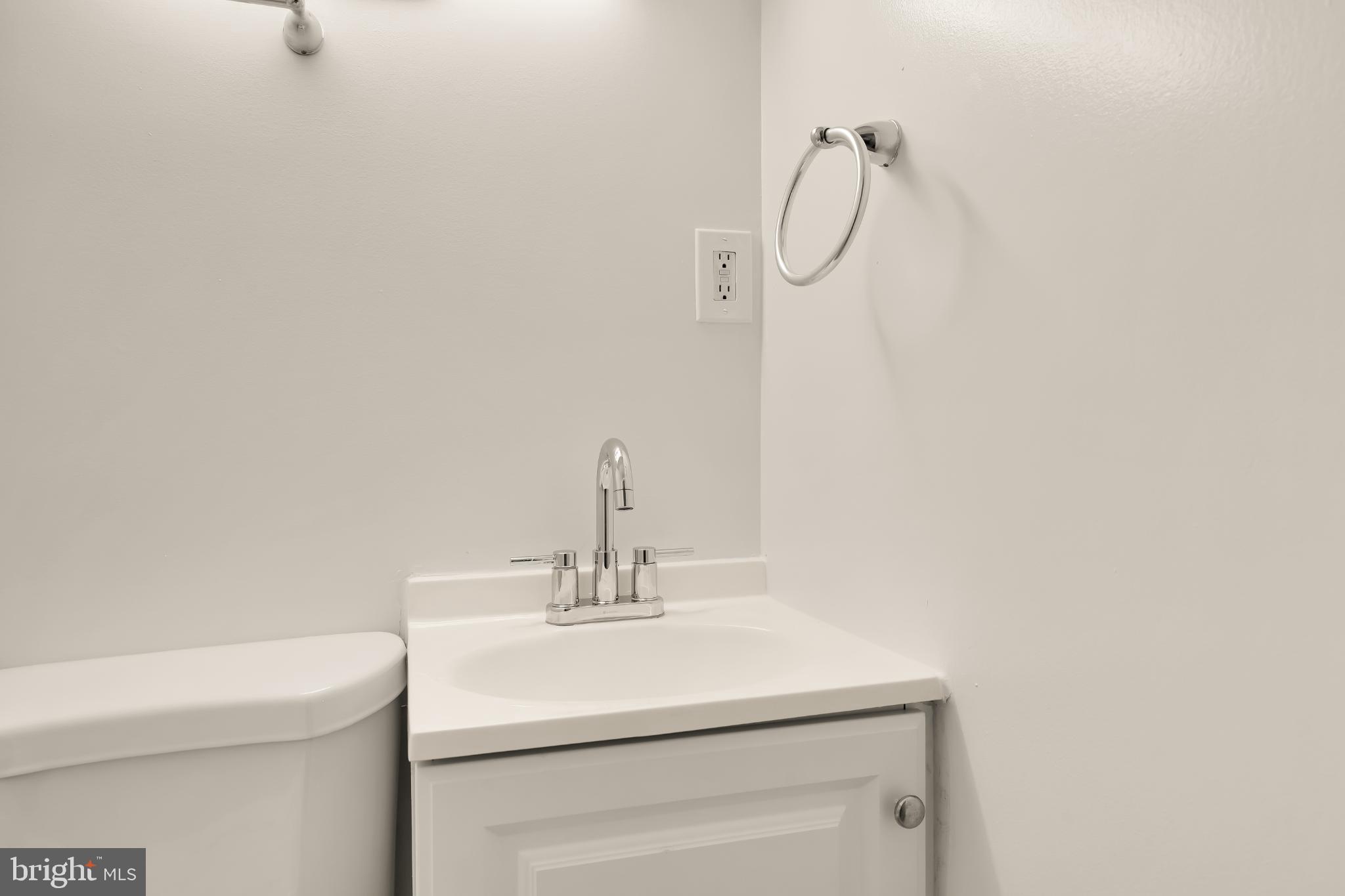 31 Florida Avenue Northeast Washington, DC 20002 - Photo 44 of 46 a bathroom with a sink and a mirror