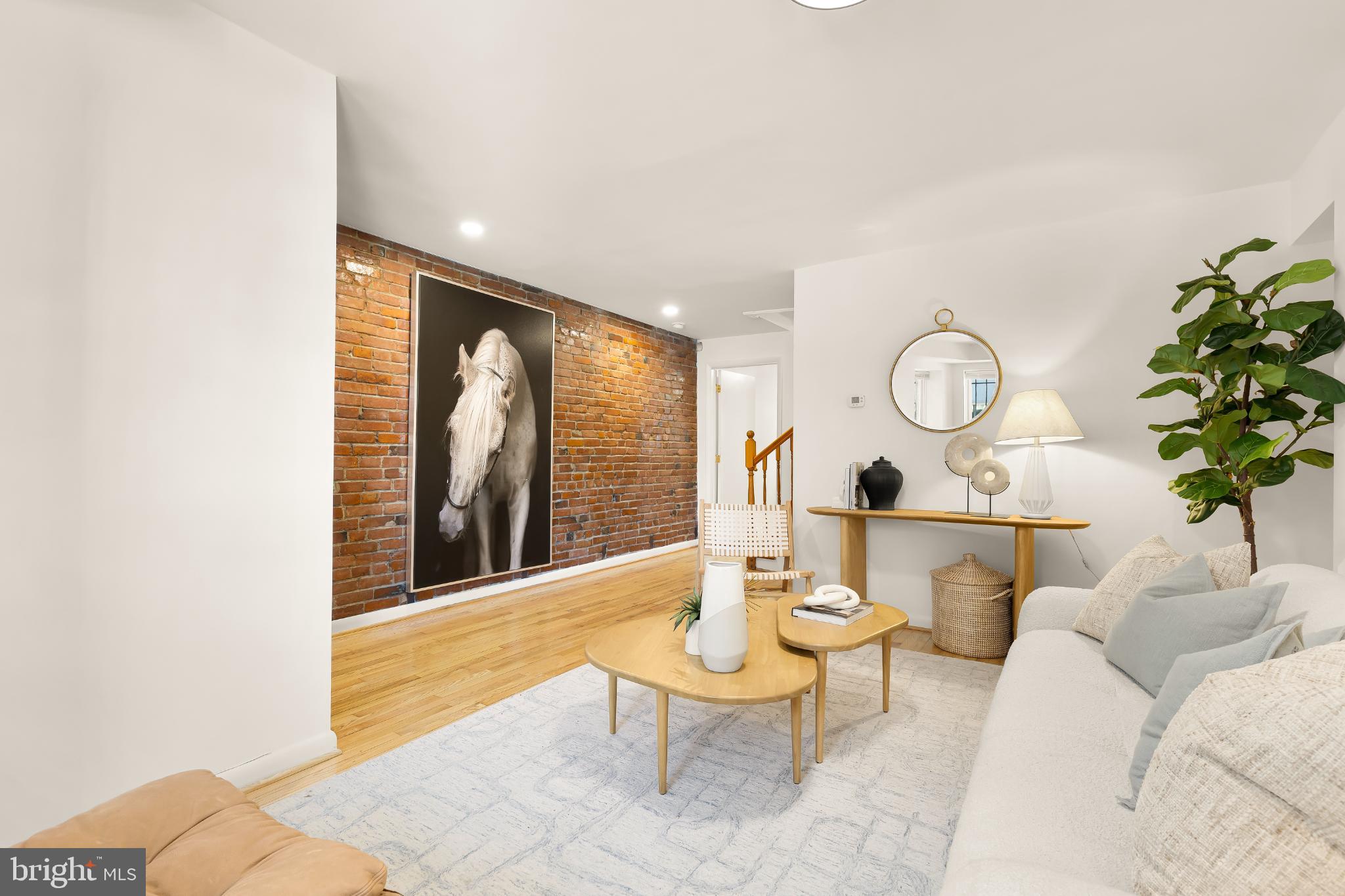 31 Florida Avenue Northeast Washington, DC 20002 - Photo 8 of 46 a living room with furniture and wooden floor