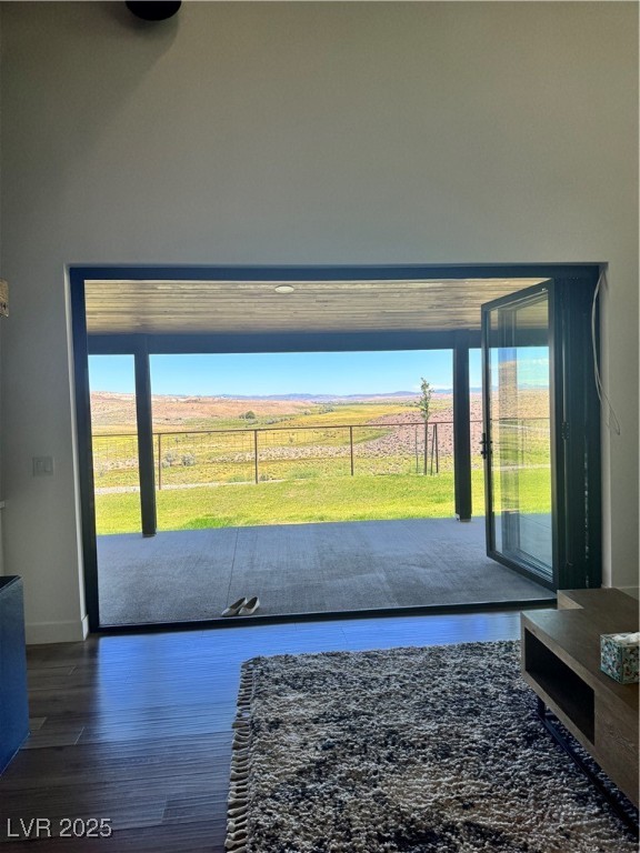 8946 Highway 93 Caliente, NV 89008 - Photo 12 of 40 Doorway with wood finished floors and baseboards