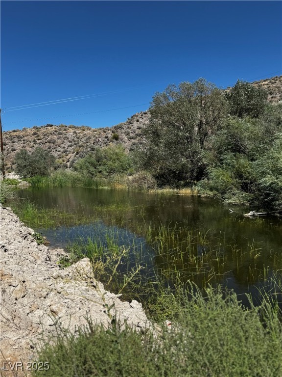 8946 Highway 93 Caliente, NV 89008 - Photo 5 of 40 Water view featuring a mountain backdrop