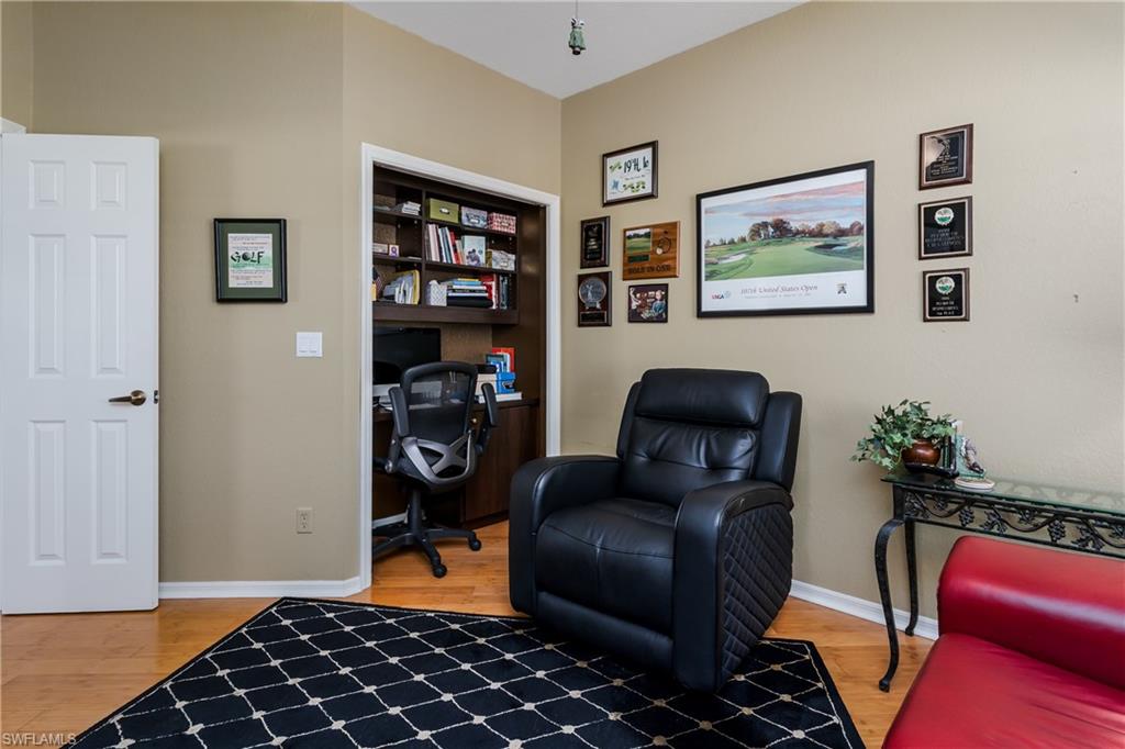 640 Lalique Circle, Unit 405 Naples, FL 34119 - Photo 17 of 49 a living room with furniture
