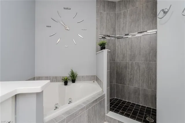 a bedroom with bed and window