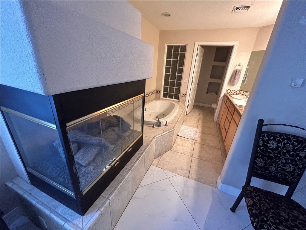 211 Moser Avenue, Unit R2 Bullhead City, AZ 86429 - Photo 9 of 16 a view of an entryway with wooden floor and door