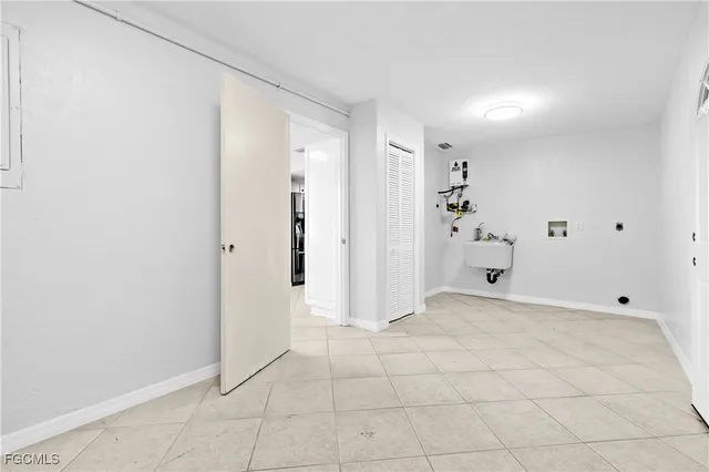 a view of a room with white walls