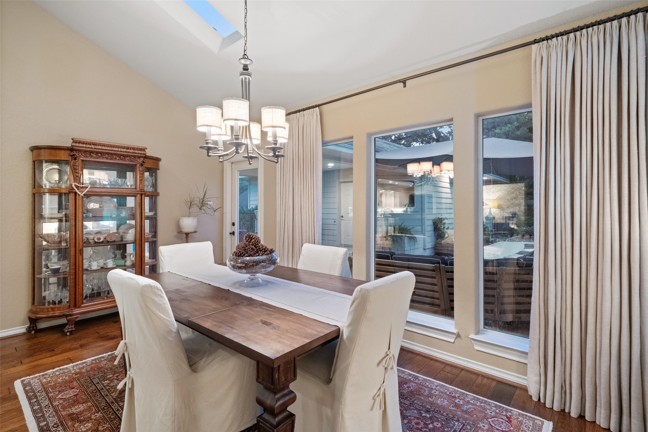 722 Shadow Brook Drive Spring, TX 77380 - Photo 15 of 27 a view of a dining room with furniture wooden floor and chandelier