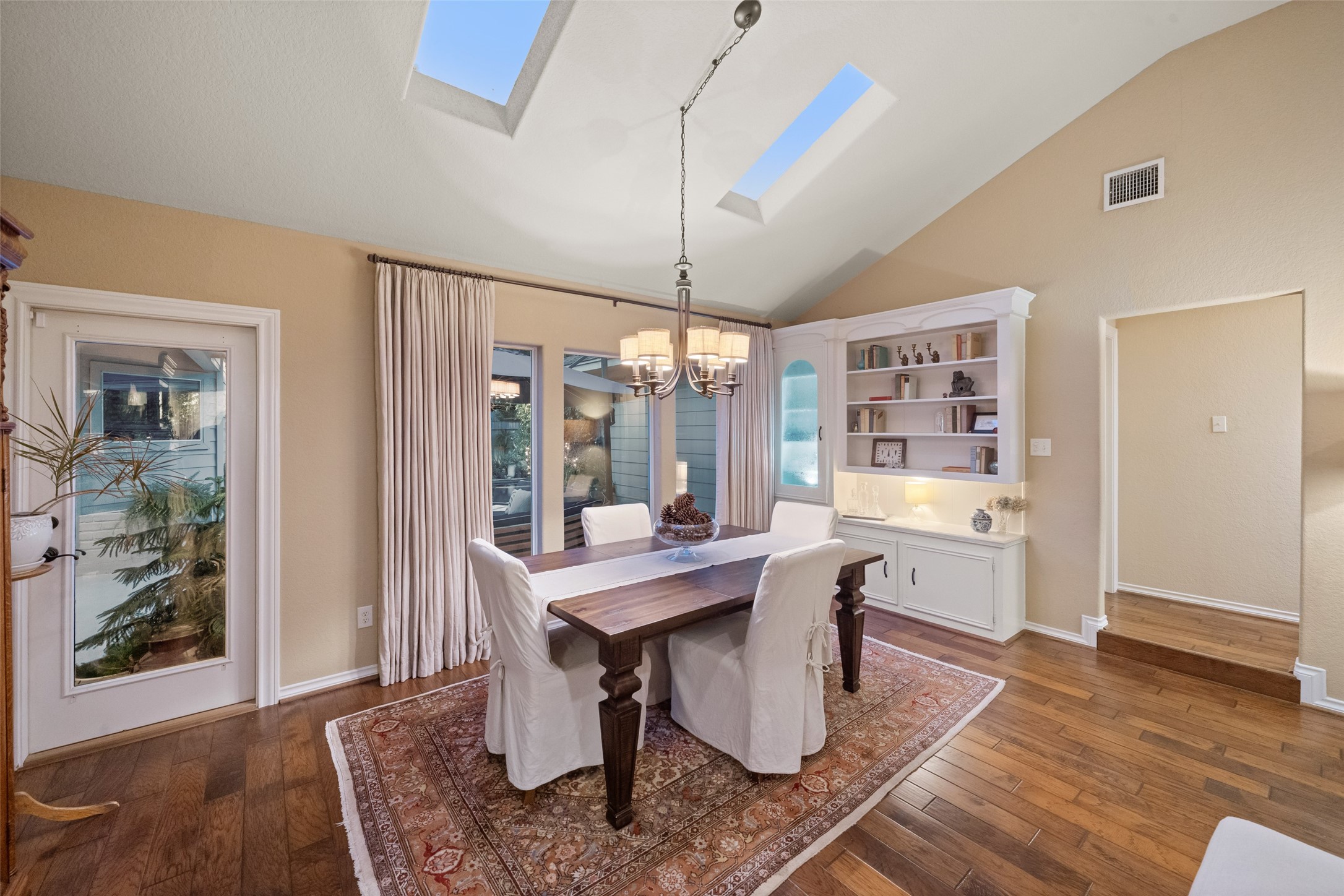 722 Shadow Brook Drive Spring, TX 77380 - Photo 16 of 27 a view of a dining room with furniture window and wooden floor